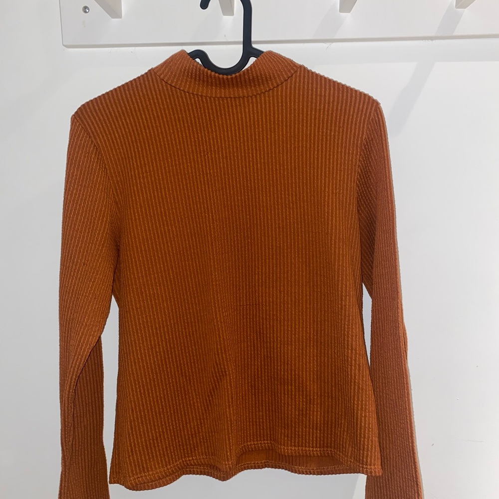 Orange turtleneck